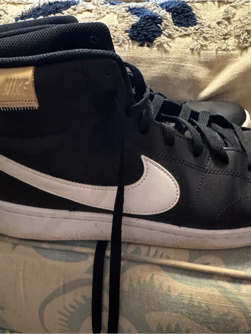 Nike Black High-Top Sneakers with White Swoosh